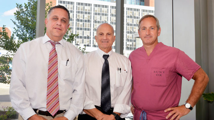 Physicians shown in the photo are Mark Charlamb of the Cardiovascular Group of Syracuse; Robert Corona, chief executive officer of Upstate University Hospital; and G. Randall Green, division chief of cardiac surgery and director of the Upstate Heart Institute.