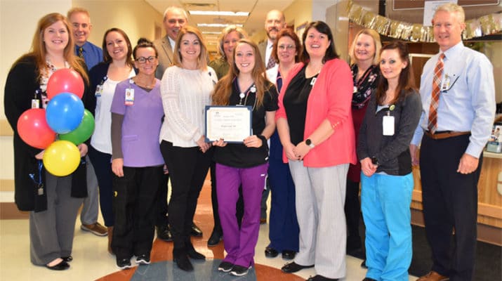 Oswego Health presents Morgan Engle, RN with an I CARE Award for going above and beyond for her patients and for continuously having a positive attitude.