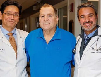 Patient Tim Andrews, 67, surrounded by his doctors at Mass General Brigham in Boston